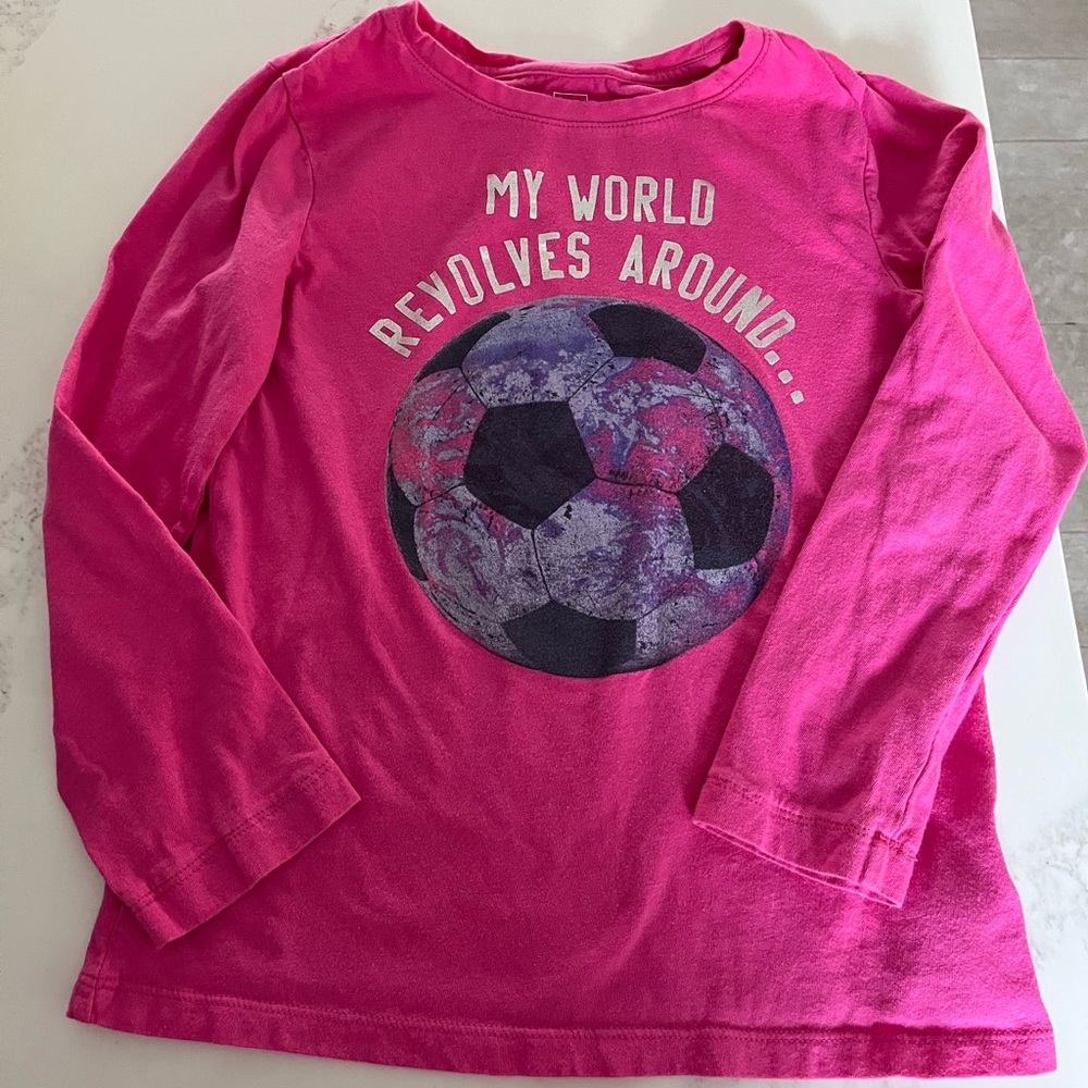 Girls gap shirt size 10. Pink shirt “my world revolves around soccer”!